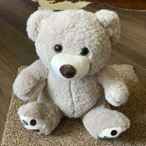 Cream colored teddy bear 10”